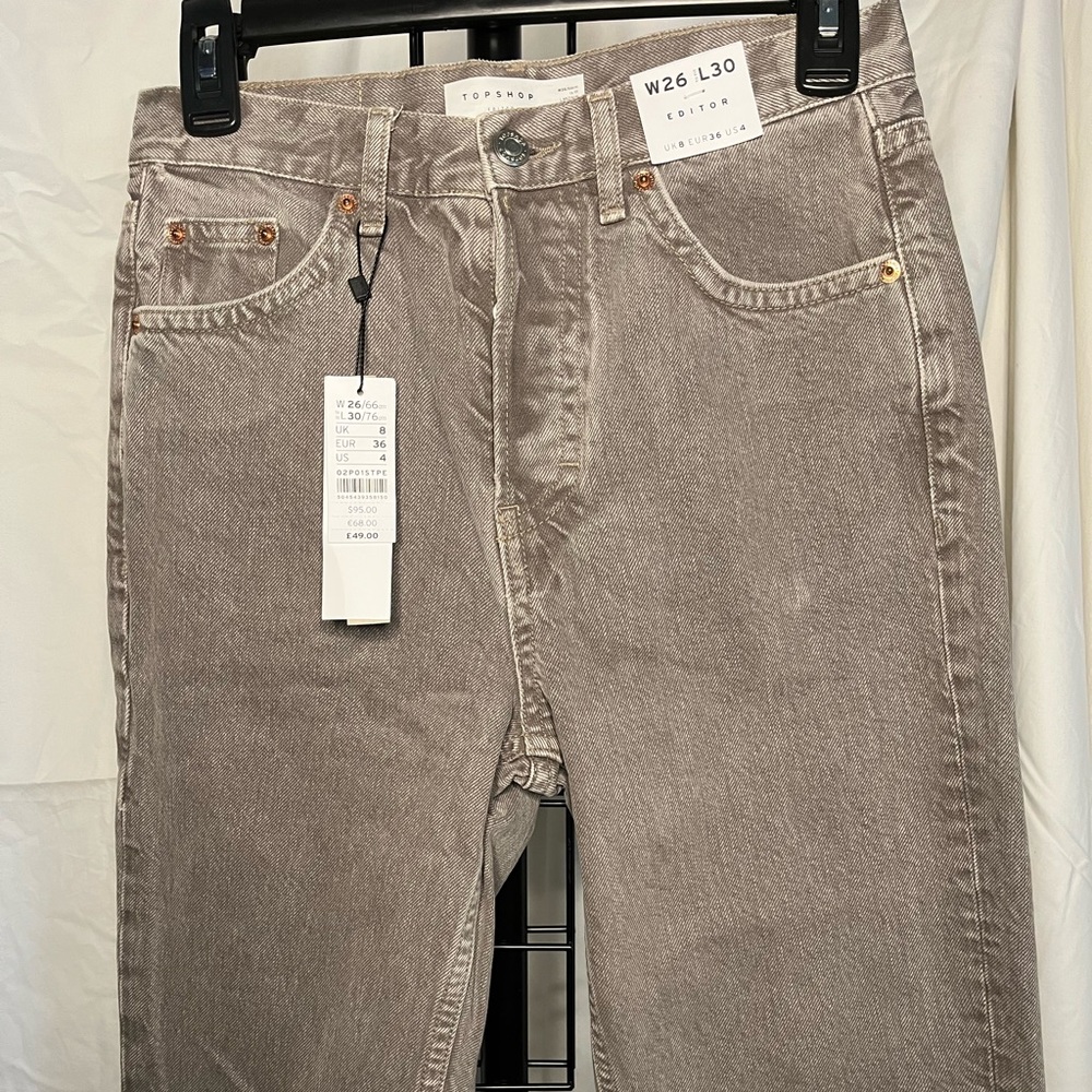 Top shop Editor Jeans stonewashed/gray in coloration w stunning copper accents.